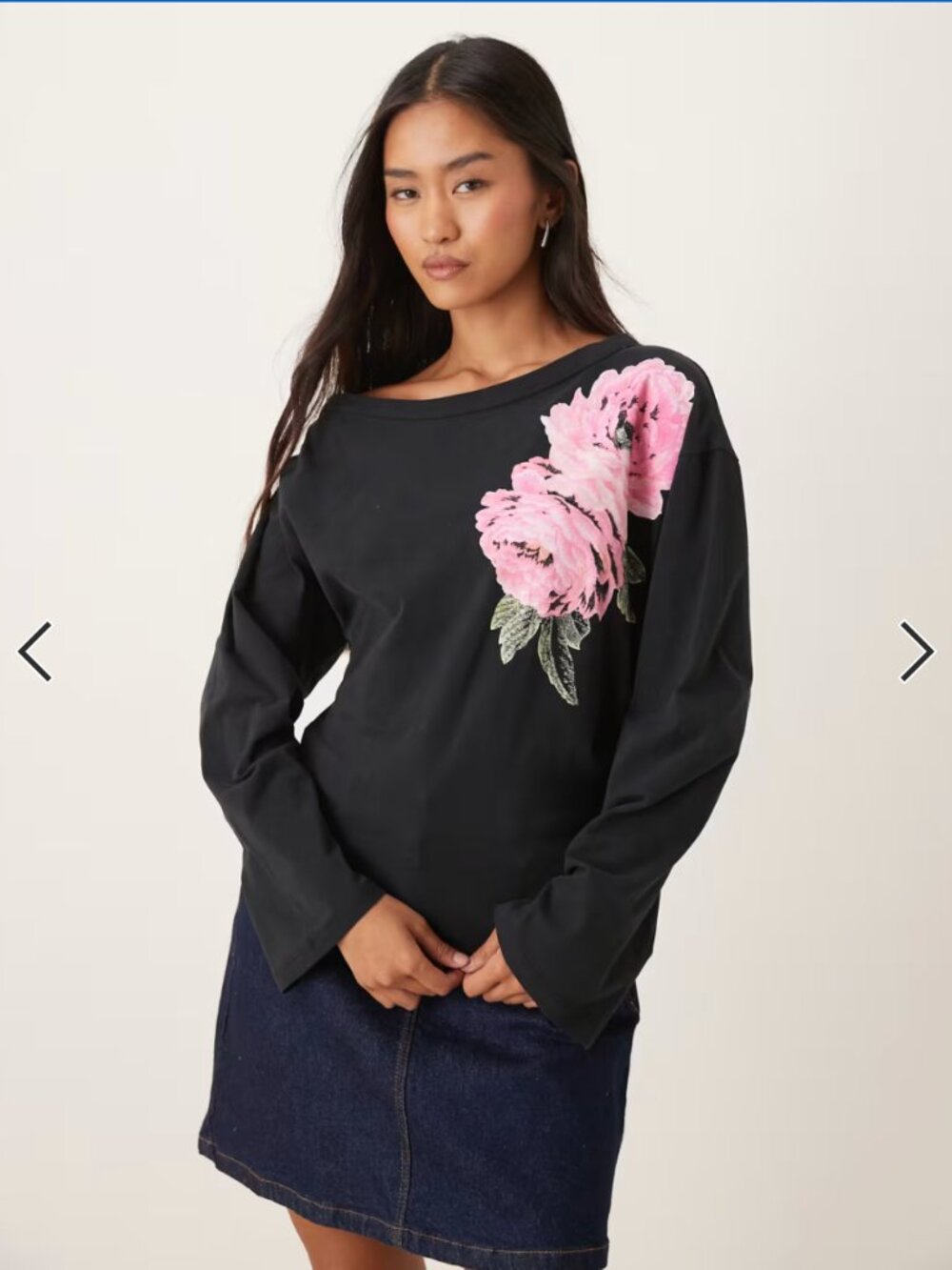 ASOS DESIGN cinched waist slash neck top in black with flower graphic